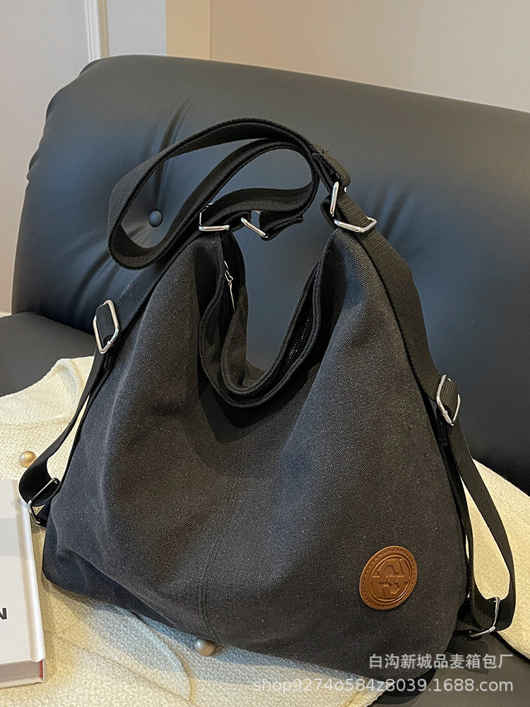Convertible Canvas Shoulder Backpack for Women – 2-in-1 Drawstring Sling Tote Bag (Black)